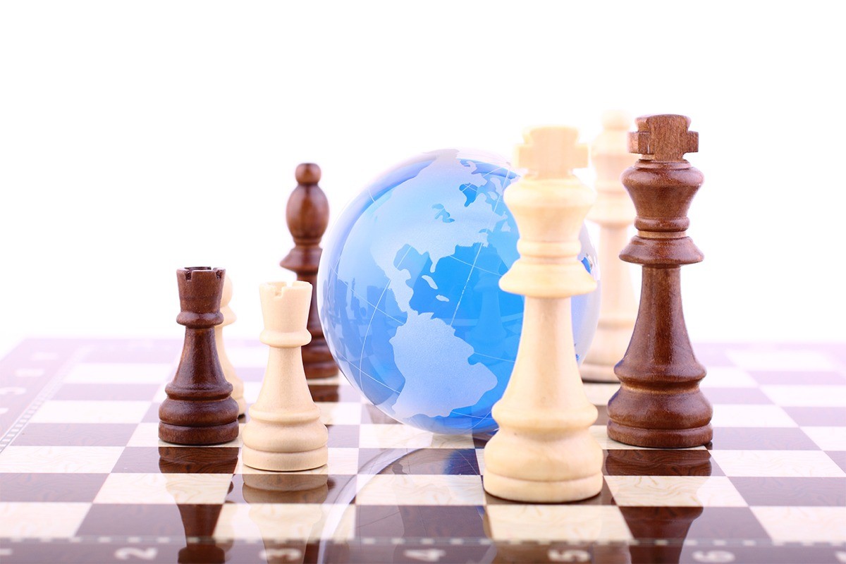 Medical Claims Management - Blue globe on chessboard